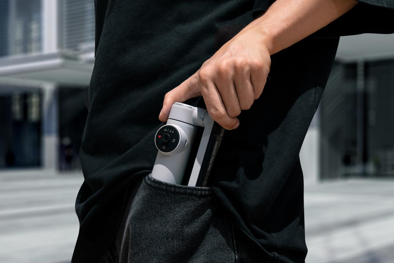 A shot of Insta360 Flow 2 Pro, folded away and in a pocket.